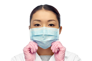 Image showing asian female doctor in medical mask and gloves