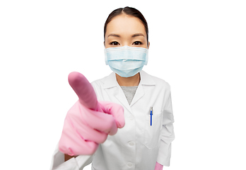 Image showing asian female doctor in mask pointing finger to you