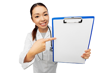 Image showing happy smiling asian female doctor with clipboard