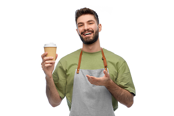 Image showing happy smiling barman in apron with takeaway coffee