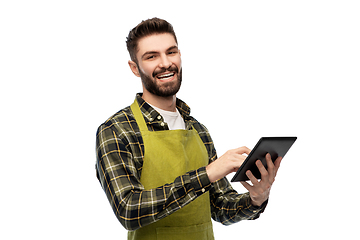 Image showing happy male gardener or farmer with tablet pc