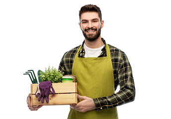 Image showing happy gardener or farmer with box of garden tools