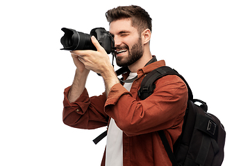 Image showing happy man or photographer with camera and backpack