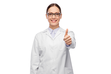 Image showing smiling female doctor in glasses showing thumbs up