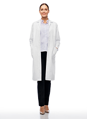 Image showing smiling female doctor or scientist in white coat