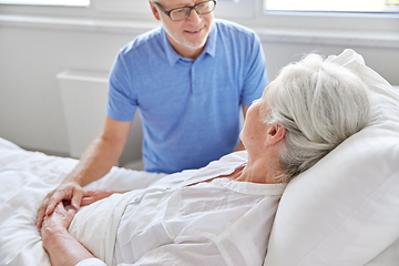 Image showing senior couple meeting at hospital ward