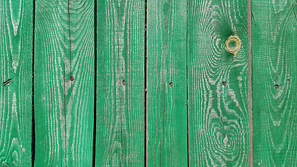 Image showing Texture of weathered wooden green painted fence