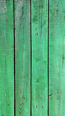 Image showing Texture of weathered wooden green painted fence