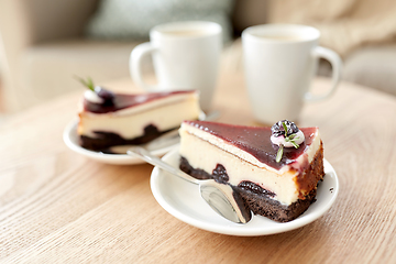 Image showing piece of chocolate cake on wooden table