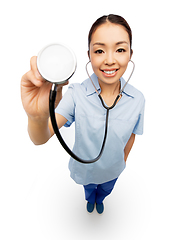 Image showing happy smiling asian female doctor with stethoscope