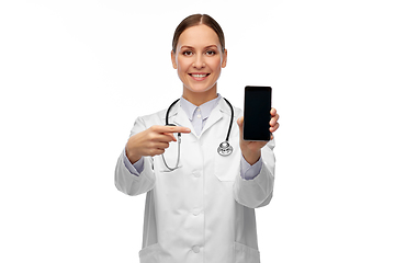 Image showing happy female doctor or nurse with smartphone