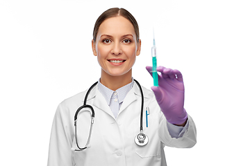 Image showing happy female doctor with medicine in syringe