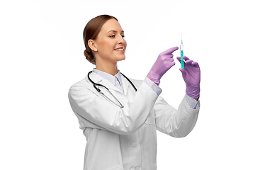 Image showing happy female doctor with medicine in syringe