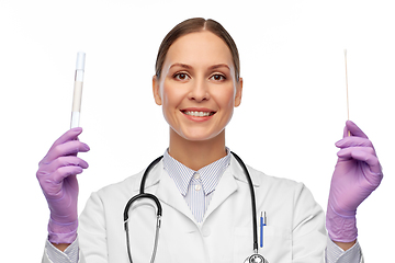 Image showing happy female doctor with test tube and cotton swab