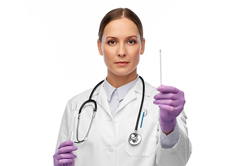 Image showing female doctor with test tube and cotton swab