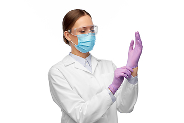 Image showing female doctor in gloves, mask and goggles