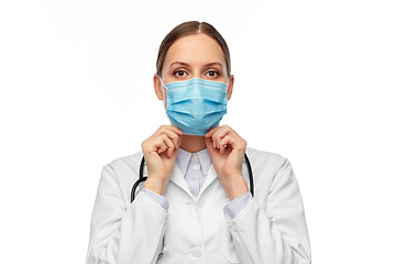 Image showing happy female doctor wearing medical mask