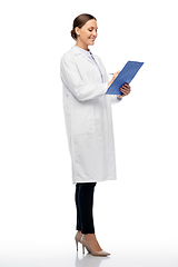 Image showing happy smiling female doctor with clipboard