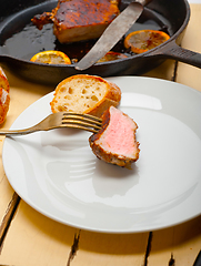 Image showing pork chop seared on iron skillet