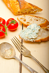 Image showing fresh blue cheese spread ove french baguette