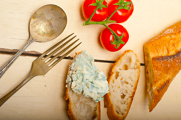 Image showing fresh blue cheese spread ove french baguette