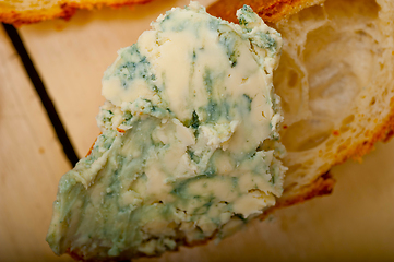 Image showing fresh blue cheese spread ove french baguette