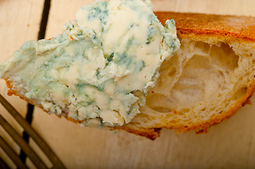 Image showing fresh blue cheese spread ove french baguette