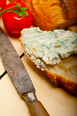 Image showing fresh blue cheese spread ove french baguette