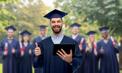 Image showing male graduate student or bachelor with tablet pc