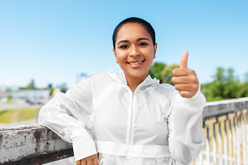 Image showing sporty african american woman showing thumbs up