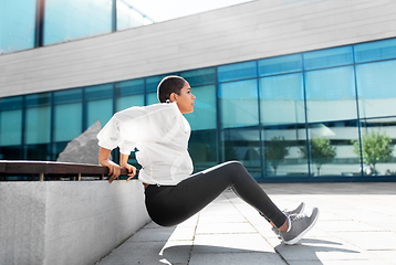 Image showing african american woman doing sports outdoors