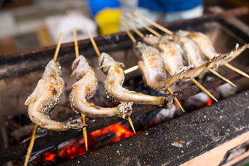 Image showing Traditional grilled fish at street in Japan