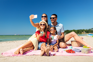 Image showing happy family taking selfie on summer beach