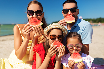 Image showing happy family with watermelon on picnic on beach