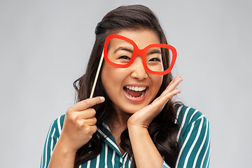 Image showing happy asian woman with big party glasses