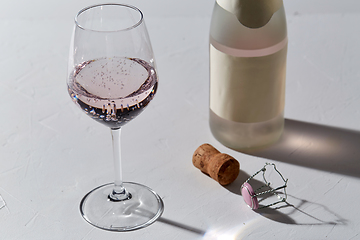 Image showing wine glasses and champagne bottle dropping shadows