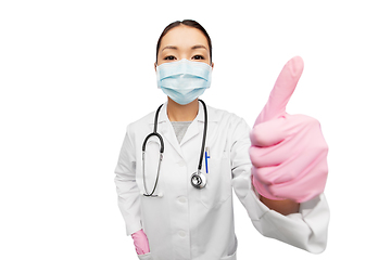 Image showing asian female doctor in mask showing thumbs up