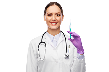 Image showing smiling female doctor with medicine in syringe