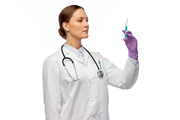 Image showing female doctor with medicine in syringe