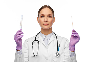 Image showing female doctor with test tube and cotton swab