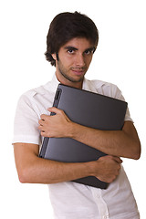 Image showing man holding a laptop