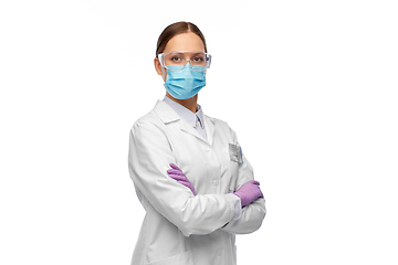 Image showing female scientist in medical mask and goggles