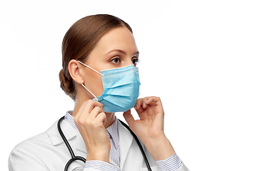 Image showing happy female doctor wearing medical mask