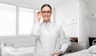 Image showing smiling female doctor in glasses at hospital