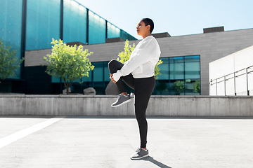 Image showing african american woman doing sports outdoors