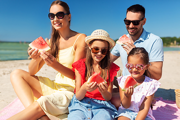 Image showing happy family having picnic on summer beach