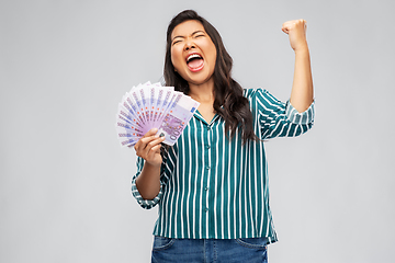 Image showing happy asian woman with money celebrating success