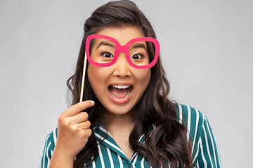 Image showing happy asian woman with big party glasses