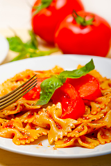 Image showing Italian pasta farfalle butterfly bow-tie and tomato sauce