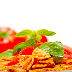 Image showing Italian pasta farfalle butterfly bow-tie and tomato sauce